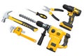 Assorted hand and power tools including drill, hammer, and pliers isolated on white background. Concept of repair and construction Royalty Free Stock Photo