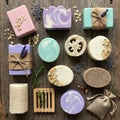 Assorted handmade soaps and bath items arranged on a wooden surface Royalty Free Stock Photo