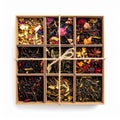 Assorted Herbal Tea Selection in Square Box with Twine on White Backdrop Royalty Free Stock Photo