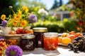assorted homemade jams with garden fruit in background