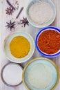 Assorted hot spicy powders in ceramic bowls Royalty Free Stock Photo