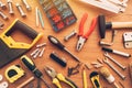 Assorted house renovation tools top view on workshop desk Royalty Free Stock Photo