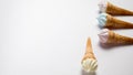 Assorted ice cream in sugar cones isolated on white background Royalty Free Stock Photo