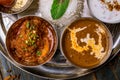 Assorted indian food set on wooden background. Dishes and appetisers of indeed cuisine, rice, lentils, paneer, samosa, spices, mas Royalty Free Stock Photo