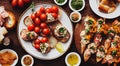 Assorted Italian food dinner bruschetta cheese vegetables and sauces.