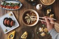 Assorted Japanese food. Famous dishes of Asian cuisine on the table. Top view. The concept of a Japanese restaurant. Asian style Royalty Free Stock Photo