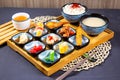 Assorted japanese food Mentaiko Chicken Wings, noodles soup, fried shrimp, sauce, ladyfinger vegetable and pork slice with Royalty Free Stock Photo