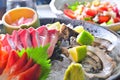 Assorted Japanese salmon sashimi oyster platter Royalty Free Stock Photo