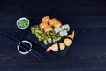 Assorted japanese sushi food. Sushi roll Philadelphia with salmon, Sushi roll Maki with eel, avocado. Shrimp sushi Royalty Free Stock Photo