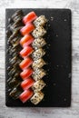 Assorted japanese sushi rolls on black background. Royalty Free Stock Photo