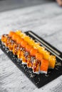 Assorted japanese sushi rolls on black background. Royalty Free Stock Photo