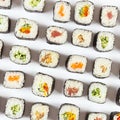 Assorted japanese sushi on white background. View from above. Royalty Free Stock Photo