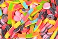 Assorted juicy colorful gummy candies. Top view. Royalty Free Stock Photo