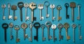 Assorted keys on blue background, safeguarding homes with unique styles