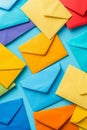 Assorted levitating colorful paper envelopes on gradient background with clean design aesthetic