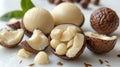 Assorted Macadamia Nuts on White Background. Generative ai Royalty Free Stock Photo