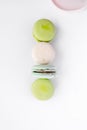 Assorted macaroons in craft paper box flat lay.white table background. top view Copyspace horizontal