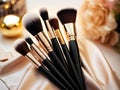 Assorted makeup brushes with copy space, beauty artist workspace, bunch of different brushes on blurred background