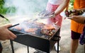 Assorted meat from chicken, pork and various vegetables on barbecue grill Royalty Free Stock Photo