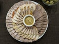 Assorted meat cuts. snack on a white plate