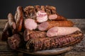 Assorted meat products including ham and sausages. ariety of processed cold meat products Royalty Free Stock Photo