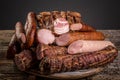 Assorted meat products including ham and sausages. ariety of processed cold meat products. top view Royalty Free Stock Photo