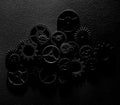 Assorted metal machine gears and components background