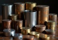 Assorted metallic cylinders in various finishes and sizes, showcasing craftsmanship Royalty Free Stock Photo