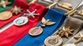 Assorted military medals displayed on ribbons, symbolizing honor and service