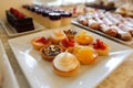 Assorted mini cakes on a plate Royalty Free Stock Photo