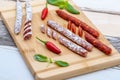 Assorted mini salami on a cutting board