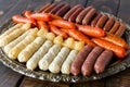 assorted mini sausages on a platter for a party