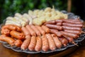 assorted mini sausages on a platter for a party