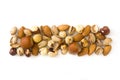 Assorted mixed nuts pattern isolated. Top view Royalty Free Stock Photo