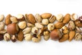 Assorted mixed nuts pattern isolated. Top view Royalty Free Stock Photo