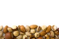 Assorted mixed nuts pattern isolated. Top view Royalty Free Stock Photo