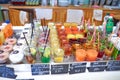 Assorted multi-colored drinks - lemonade, strawberry compote, juice, tea without tea