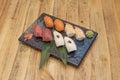 Assorted nigiri sushi tray with bluefin tuna, Norwegian salmon, white rice Royalty Free Stock Photo