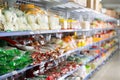 Assorted noodle packages arranged on shelves of Asin grocery store in Reus