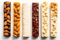 Assorted nut bars on white background. Top view of various healthy granola bars. Set of energy, sport, breakfast and