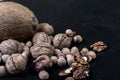 Assorted nuts on a black background Royalty Free Stock Photo