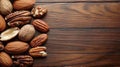 Assorted nuts on dark wooden table Royalty Free Stock Photo