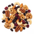Assorted nuts and dried fruits arranged in a circular pattern on a white background Royalty Free Stock Photo