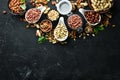 Assorted nuts on the old black background. Royalty Free Stock Photo