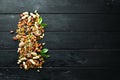Assorted nuts on the old black background. Royalty Free Stock Photo