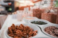 Assorted nuts and seeds in a bowl on a table in a Venetian hotel or restaurant.