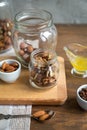 Assorted nuts: walnuts, almonds, hazelnuts and honey