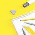 Assorted office and school stationery office supplies on yellow