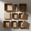 Assorted open cardboard boxes of varying sizes are arranged on a flat surface. The boxes are square Royalty Free Stock Photo