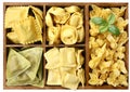 Assorted pasta with fillings in a wooden box